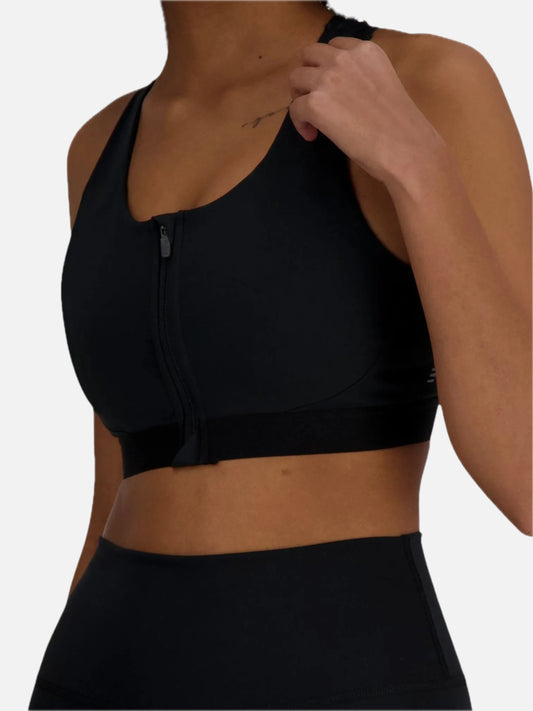 Top Deportivo New Balance Mujer NB Sleek Medium Support Pocket Zip Training — vista principal